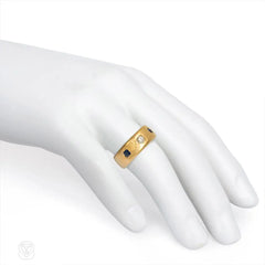 Antique hammered gold three-stone ring