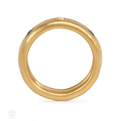 Antique hammered gold three-stone ring