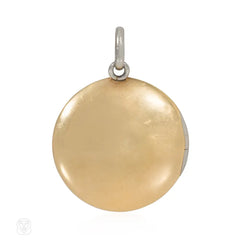 Antique platinum and diamond round locket