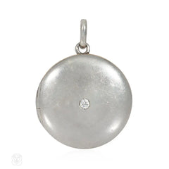 Antique platinum and diamond round locket