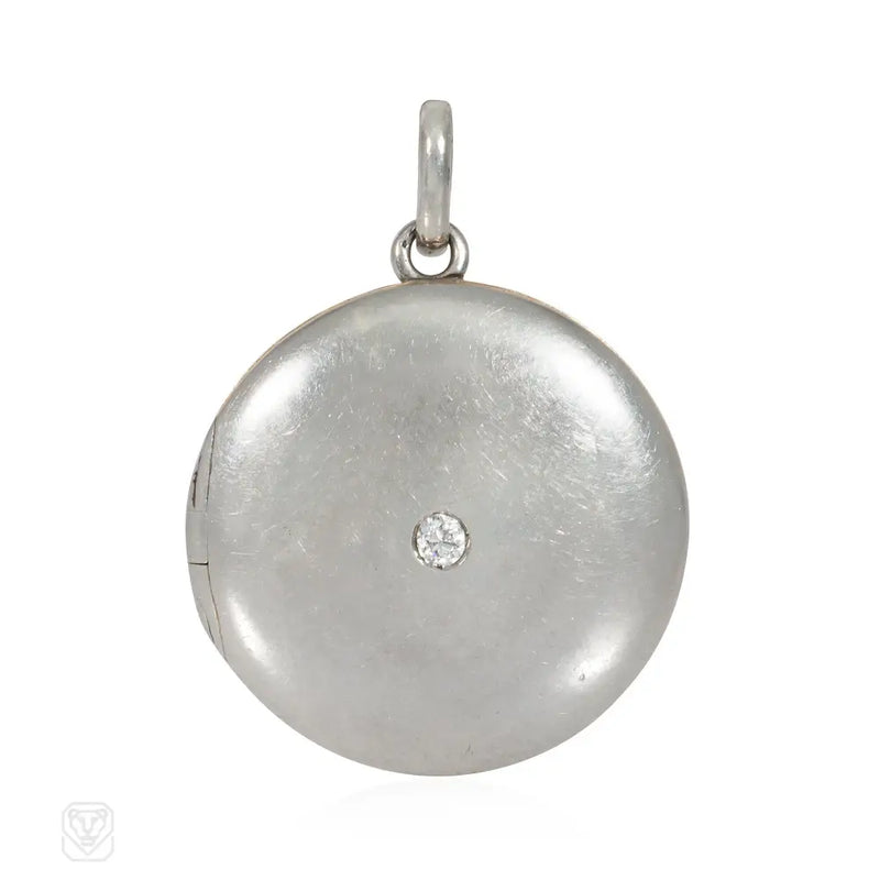 Antique platinum and diamond round locket