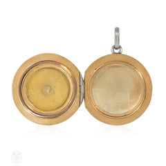 Antique platinum and diamond round locket