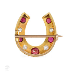 Antique ruby and diamond horseshoe brooch