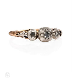 Antique three-stone diamond ring