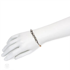 Antique undulating pearl and diamond bangle