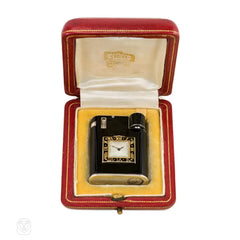 Art Deco black enamel lighter with timepiece, Cartier