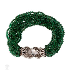 Art Deco diamond and emerald torsade bracelet