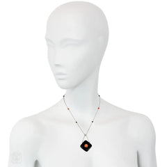 Art Deco onyx, coral, and diamond pendant necklace