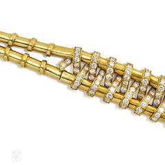 Articulated diamond-wrapped gold bracelet