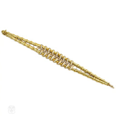 Articulated diamond-wrapped gold bracelet