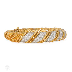 Articulated wrapped gold and diamond bracelet