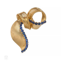 Cartier 1950s Gold and Sapphire Bow Ribbon Brooch