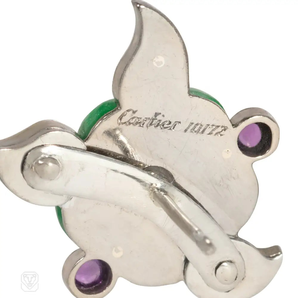 Cartier Art Deco jade, amethyst, diamond, and enamel flower