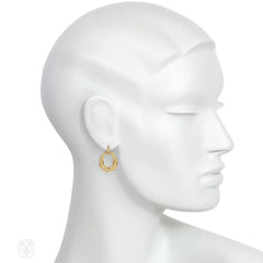 Cartier gold and diamond doorknocker earrings