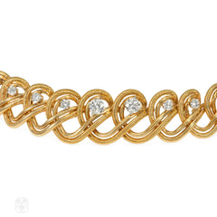 Cartier Mid-Century gold and diamond scrolling necklace