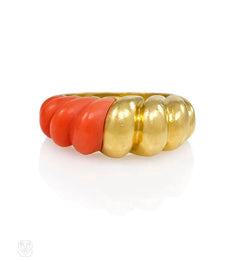 Carved coral and gold ring