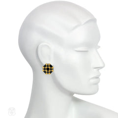 Cipullo for Cartier onyx and gold disc-shaped earrings.
