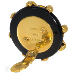 Cipullo for Cartier onyx and gold disc-shaped earrings.