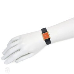 Delaneau gold and coral tank watch