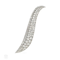 Diamond and platinum swirl design brooch