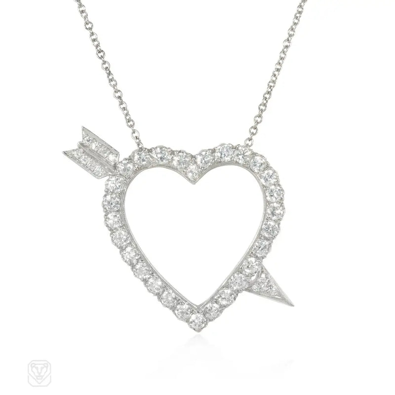 Diamond Cupid’s heart pendant and brooch