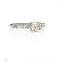 Engraved platinum and diamond Art Deco engagement ring