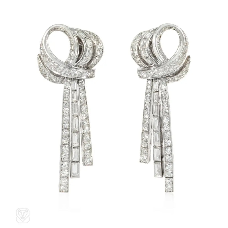 French day-to-night diamond loop and tassel earrings