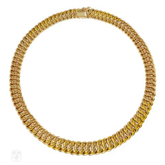 French reversible, graduated gold necklace