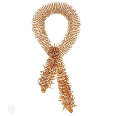 Gilt lariat with bear claw terminals