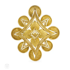 Gold abstract starburst brooch and pendant, Cartier