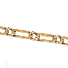 Gold and diamond elongated curblink bracelet. Van Cleef & Arpels