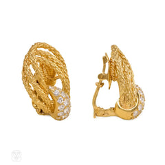 Gold and diamond loop design earrings