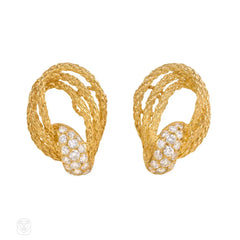 Gold and diamond loop design earrings