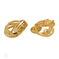 Gold and diamond loop design earrings