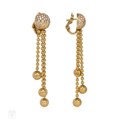 Gold and diamond Nouvelle Vague earrings. Cartier, Paris