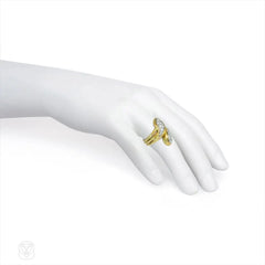 Gold and diamond stylized double serpent ring, Van Cleef & Arpels