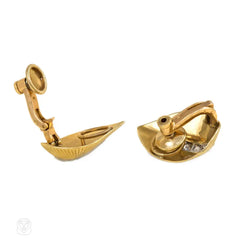 Gold and diamond stylized leaf earclips, Cartier Paris