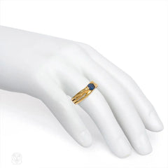 Gold and sapphire wrapped ring, France