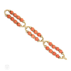 Gold, coral bead, and diamond bracelet
