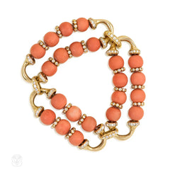 Gold, coral bead, and diamond bracelet