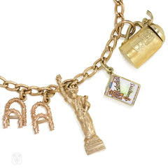 Gold curblink charm bracelet wtih 12 charms