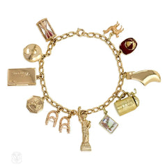 Gold curblink charm bracelet wtih 12 charms