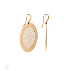 Gold disk pendant earrings, Enigma