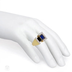 Gold kinetic ring set with diamonds, onyx, lapis, and tiger eye