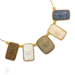 Gold necklace with antique lava cameos
