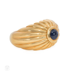 Gold ribbed bombé sapphire ring, Cartier