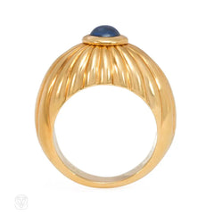 Gold ribbed bombé sapphire ring, Cartier
