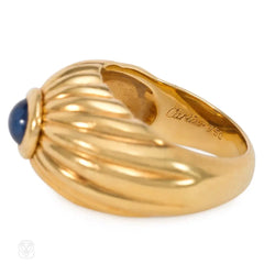 Gold ribbed bombé sapphire ring, Cartier