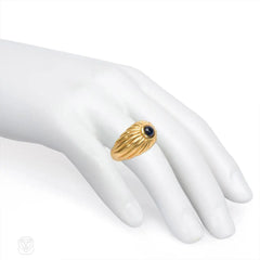 Gold ribbed bombé sapphire ring, Cartier
