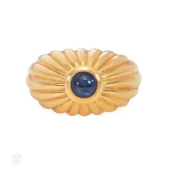 Gold ribbed bombé sapphire ring, Cartier